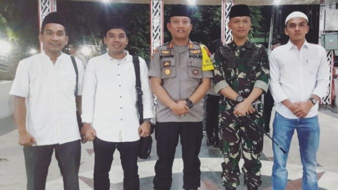 Kapolres Pematangsiantar AKBP Heribertus Ompusunggu,Letkol Inf Frans Kishin Panjaitan SAP MPM Bersama Sekjen KNPI Pematang Siantar Arif Harahap,SE