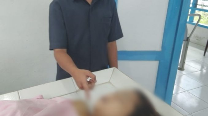 korban saat berada di Rumah Sakit Umum keruang IGD untuk dilakukan visum.,foto ist