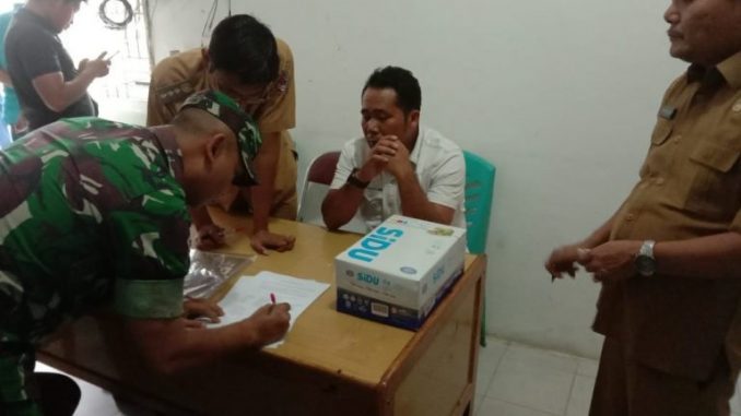 Penandatanganan BA pemeriksaan Kertas Suara Pilkades Lumban Gaol, Balige, Selasa (19/11/2019)