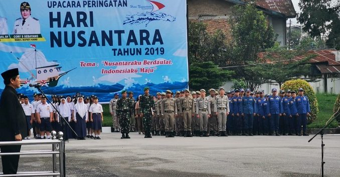 Ket foto : bupati karo Terkelin Brahmana, SH Irup dalam Hari Nusantara 2019 di halaman kantor bupati karo. foto terkelinbukit