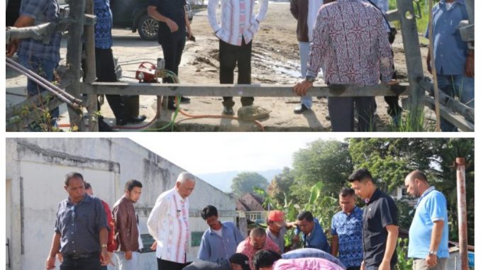 Bupati Toba Samosir (Toba) Darwin Siagian meninjau langsung kondisi areal irigasi Silakkupak di Gang Siantar Kelurahan Balige 1,Kecamatan Balige,Toba, Kamis (23/1/2020).