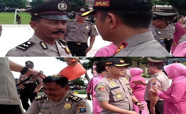 KAPOLRES Simalungun AKBP Heribertus Ompusunggu SIK.MSi pimpin upacara Korps Raport Kenaikan Pangkat Perwira dan Bintara di jajaran Polres Simalungun, TMT 01-01-2020 di Lapangan Aspol jalan Sang Naualuh kota Pematang Siantar, Selasa(31/12) pukul 14.00 wib