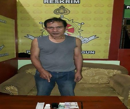 Sat Reskrim Polres Simalungun meringkus penjual judi jenis Kim Hongkong, Ramli Manurung (60)