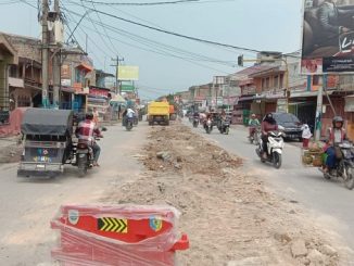 Ket/Poto : Salah Satu Median Jalan Merdeka Simpang Empat Ujung Bom Tanjung Tiram Yang Berada di Depan Bank BRI dan Kantor Pos Dibuka Kembali.