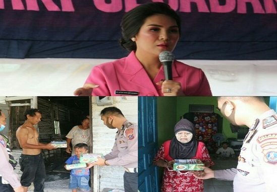 ketua Cabang Bhayangkari Simalungun dan pengurus,Ny Cathy Heri Ompusunggu bersama personil Sat Lantas melakukan aksi sosial peduli sesama dengan melakukan pemberian makan siang gratis. Minggu siang, 5 April 2020.