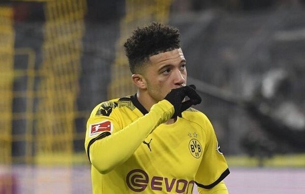 Jadon Sancho melakukan selebrasi seusai mencetak gol pada laga Borussia Dortmund v FC Cologne di Stadion Signal Iduna Park dalam lanjutan Bundesliga, kasta teratas Liga Jerman, 24 Januari 2020.(AFP/ INA FASSBENDER)