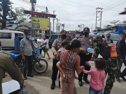 Operasi Yustisi Covid 19 di sekitaran Pasar Tumpah (Onan Porsea) , Rabu (16/09/2020), sekira Pukul 10.00 Wib