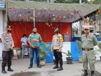 Kapolres Toba AKBP Akala Fikta Jaya S.ik, MH meninjau pengamanan libur Natal dan Tahun Baru (Nataru) di Pos Pelayanan Ajibata Kabupaten Toba, Provinsi Sumatera Utara, Sabtu (26/12/2020)